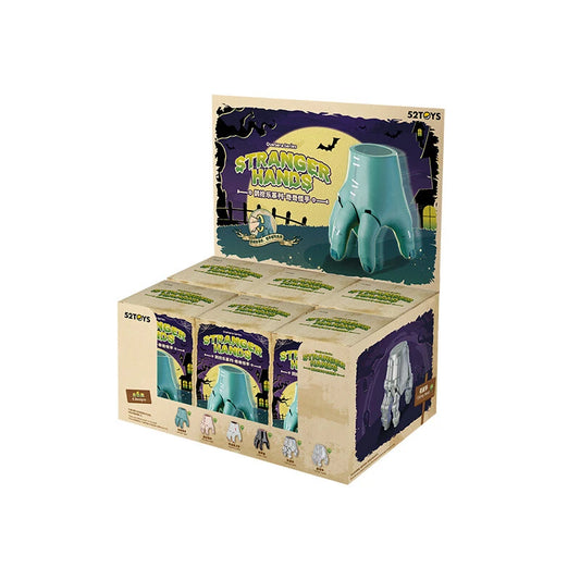 Box of 'Stranger Hands' toy with a green glove on a white background