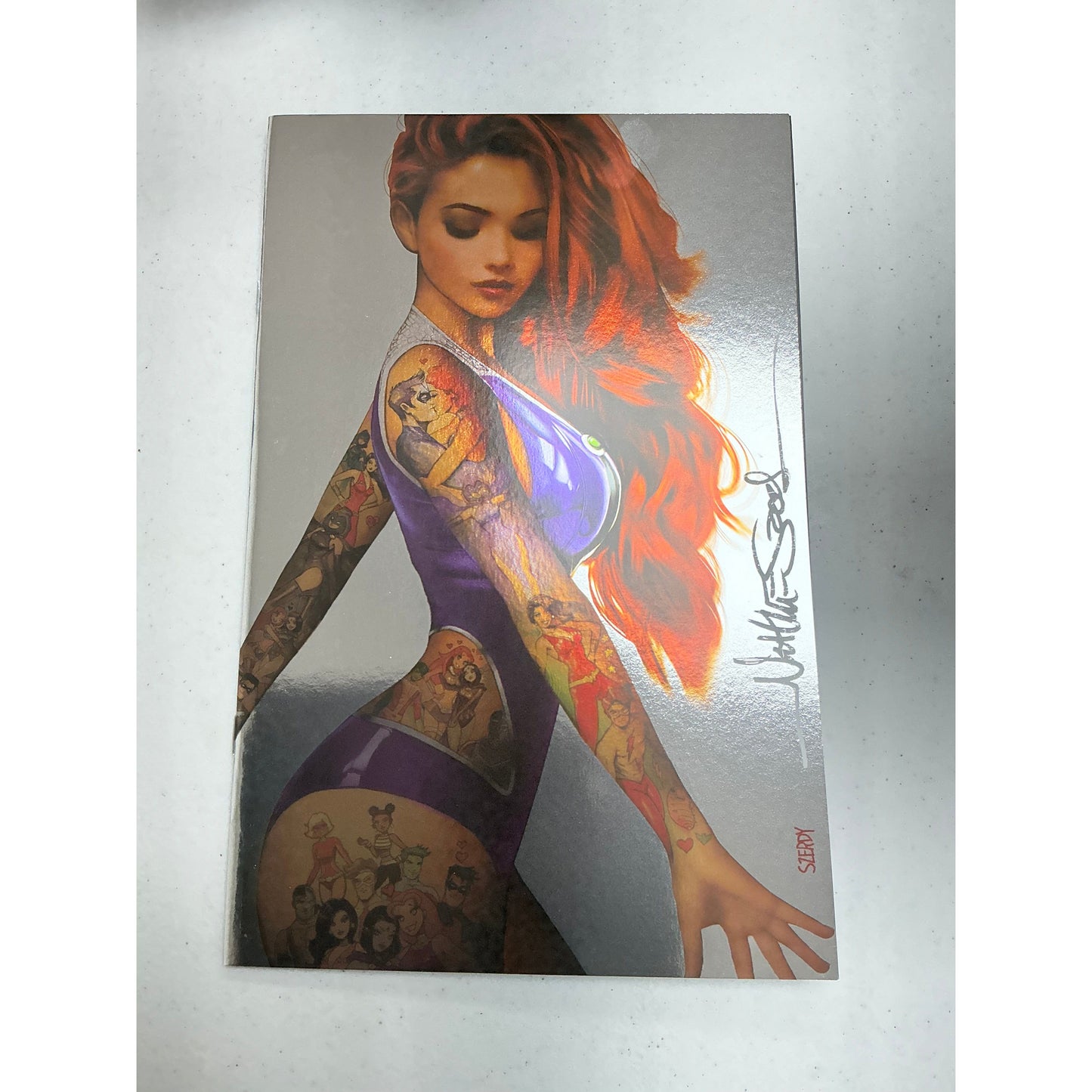 [Signed by Nathan Szerdy] [Foil] TITANS #1 NATHAN SZERDY TATTOO VIRGIN VAR [IN STOCK] (Copy)