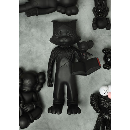A JOMMENTARY black vinyl figure by XXCRUE